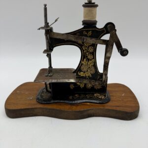 Máquina de coser juguete 1900