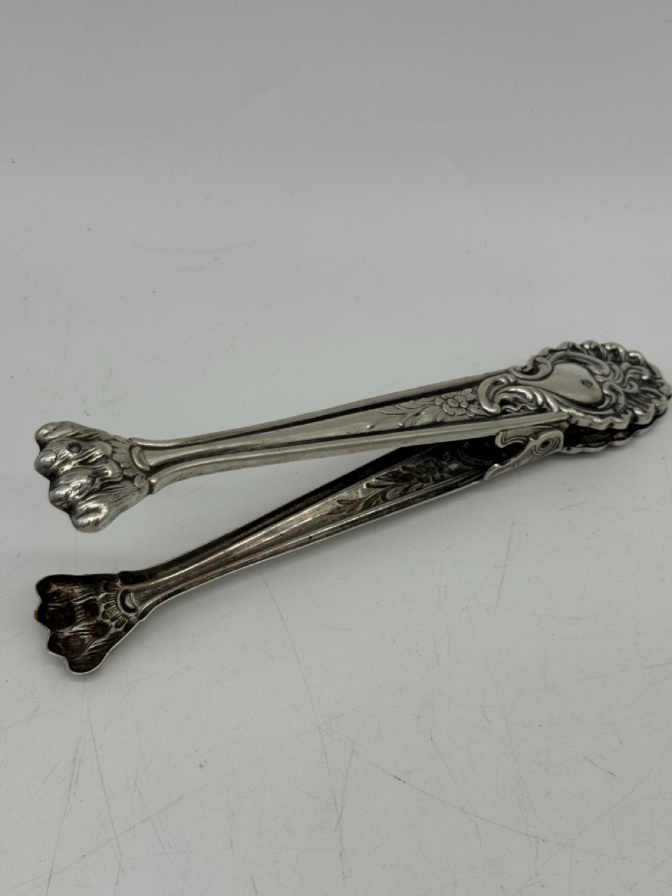 Pinza plata de ley garra